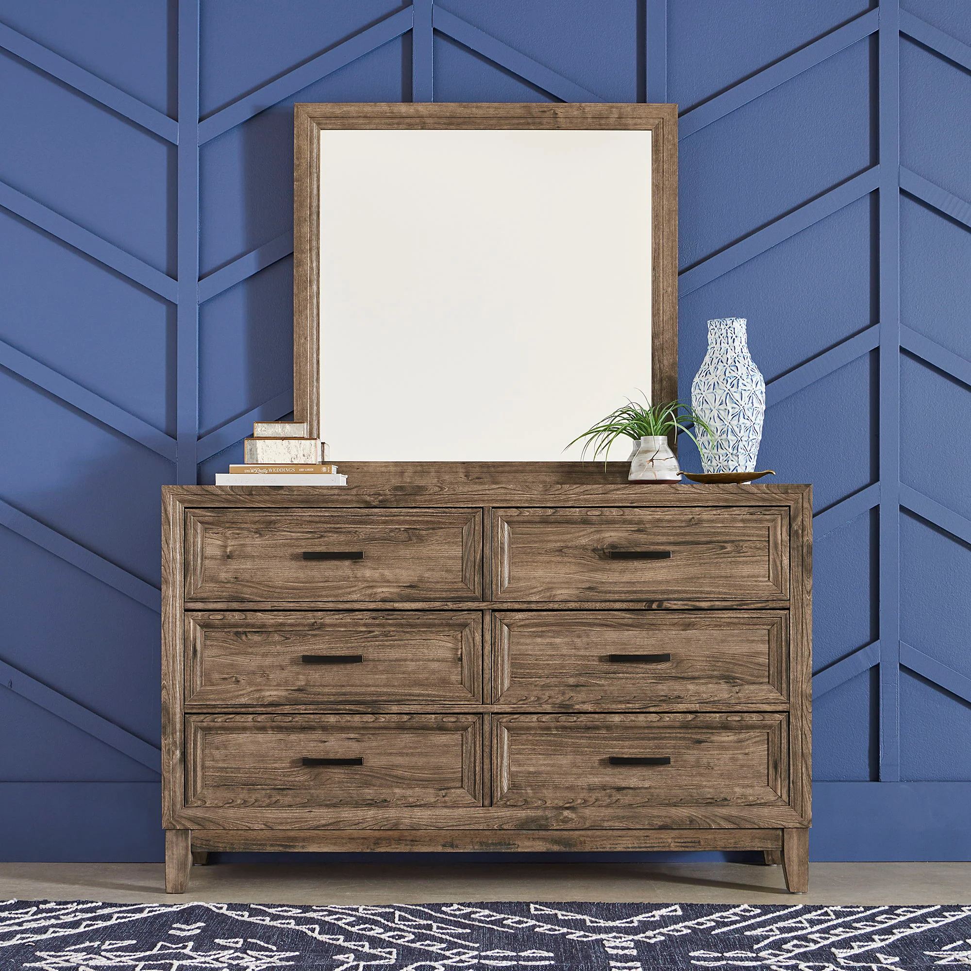 Dresser & Mirror - Light Brown — A natural feeling created by the living space as well as the furnishings that attribute to it