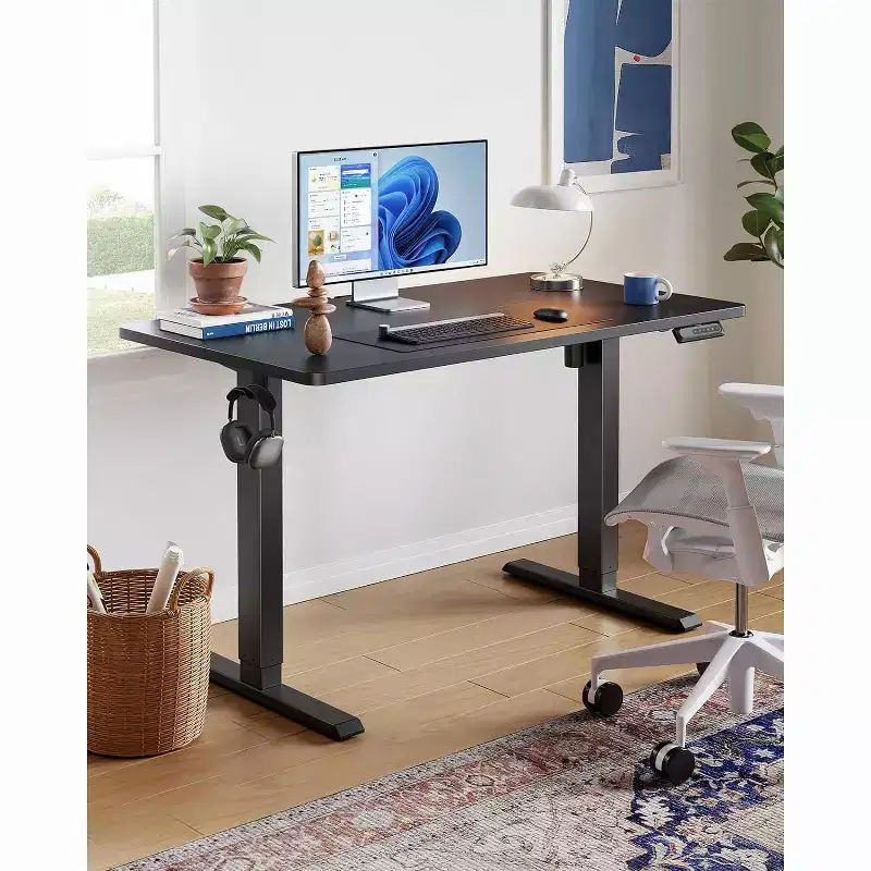 HUANUO 55x24 Electric Standing Desk, Adjustable Height, 4 Memory Settings, Headphone Hook for Home Office, Black