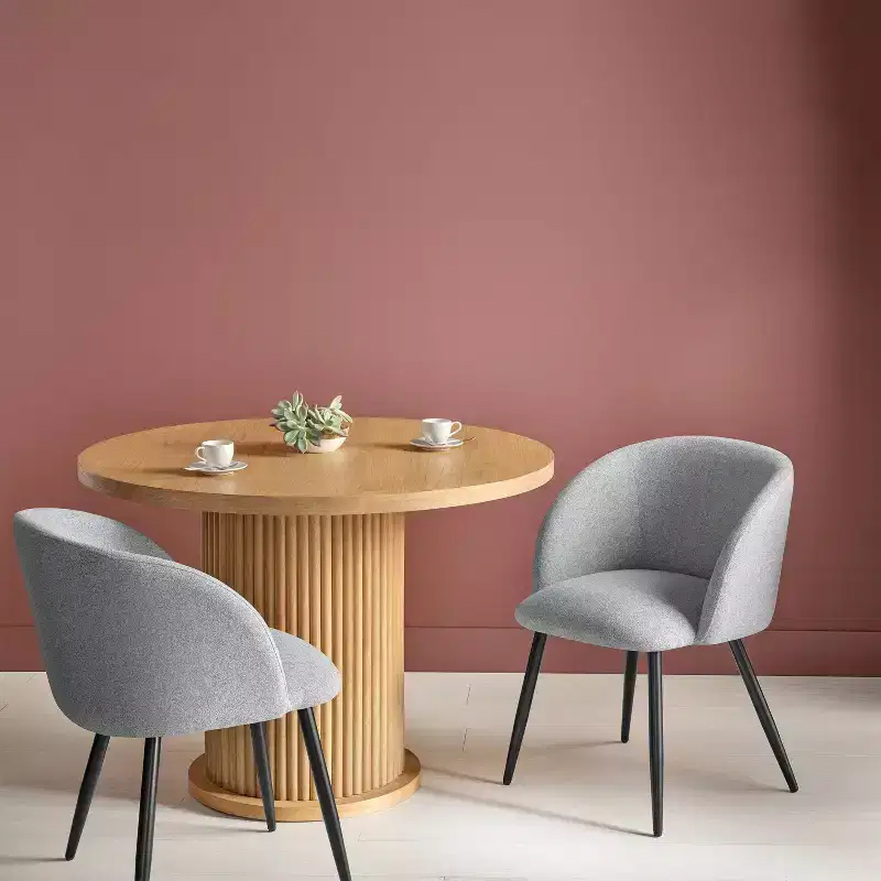 Upholstered bucket-back dining chair with metal base