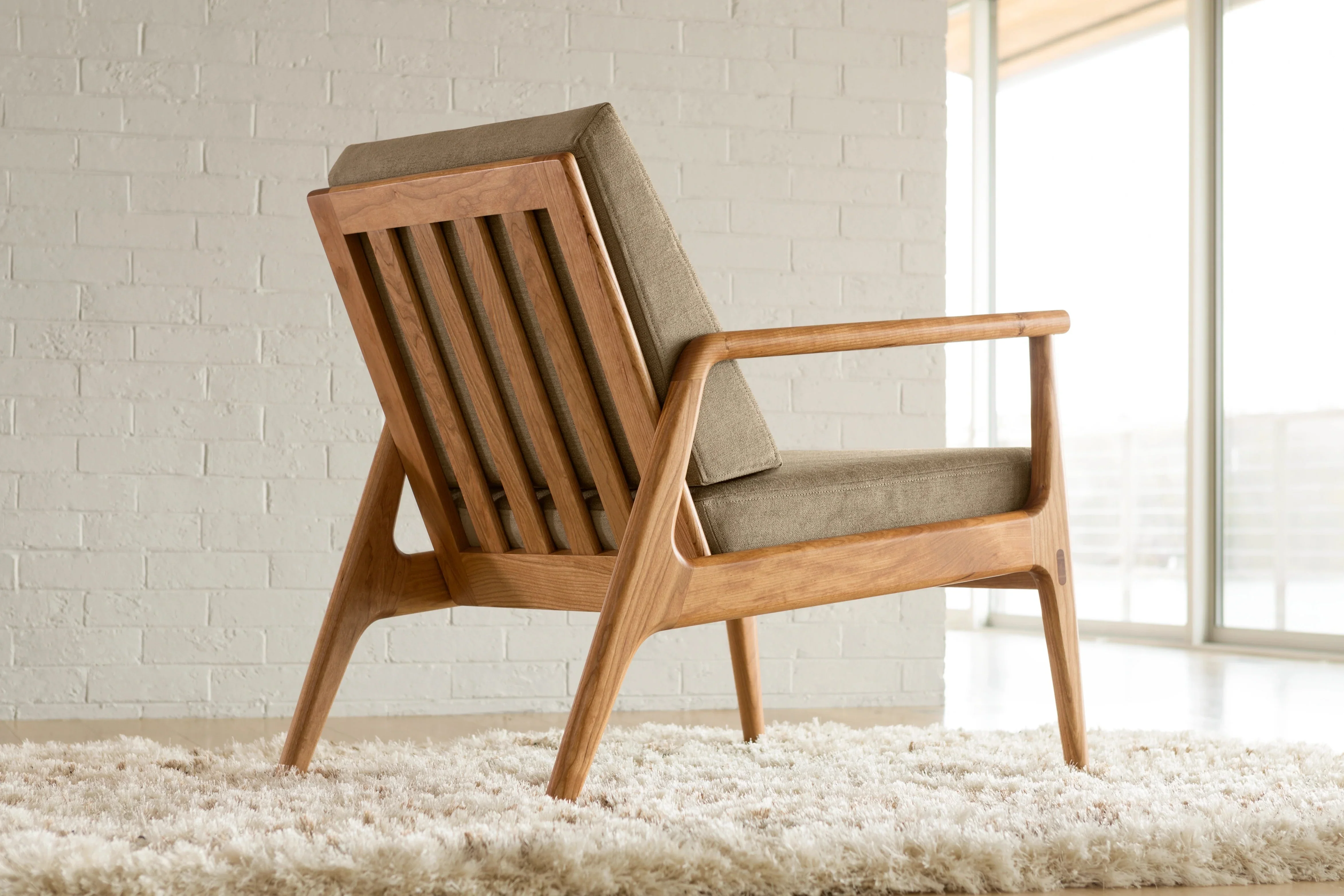 Chair - The celebrates contemporary design, the natural beauty of wood, and traditional joinery techniques that are a