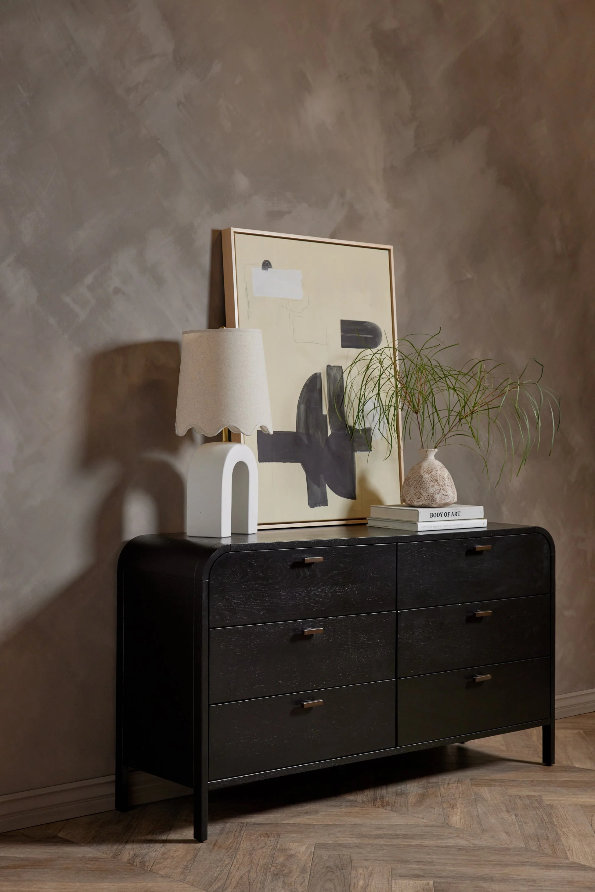 Dresser The refined finish of this dresser appealingly compliments the arched corners of its undersd design. It is fitted with sk iron pulls