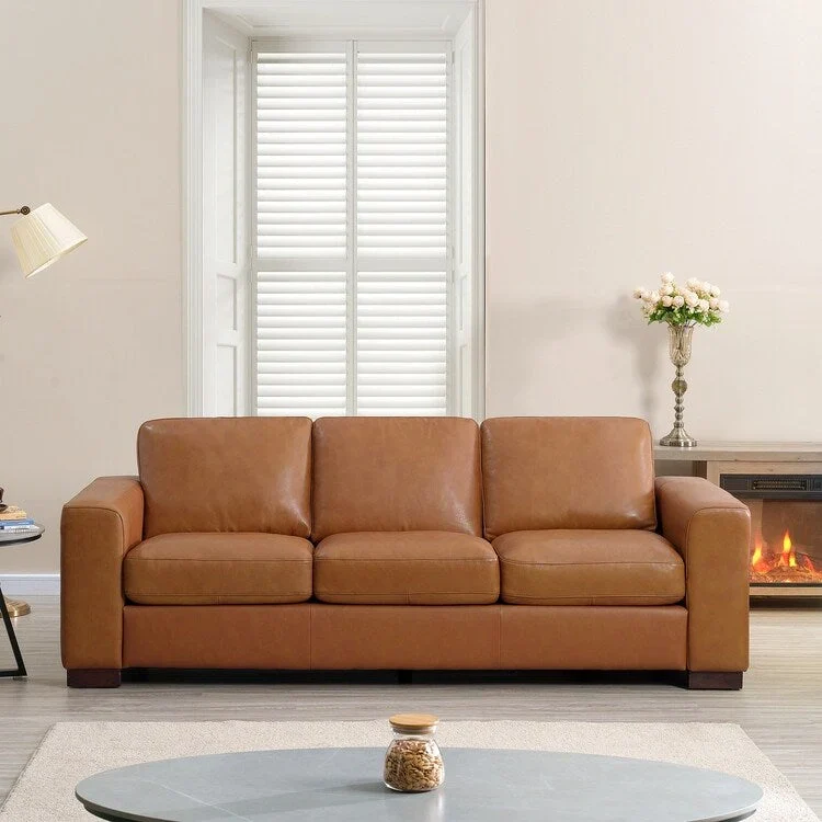 Genuine leather sofa & loveseat with feather cushions, square arms, sturdy & stylish.